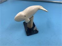 Ivory carving of a whale by Dennis Pungowiyi, moun