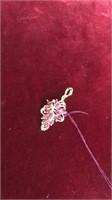 14k gold pendant with pink sapphire stones