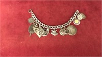 Sterling silver charm bracelet w/ ster charms