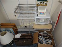 Contents of closet- lamps, TV trays, luggage,