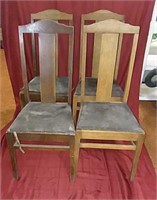 (4) Wooden Chairs with black padded  seats