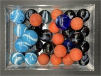 Plastic Container of Marbles 2.75” x 4” x 1”
