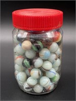 Plastic Jar of Marbles 5”