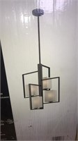 Metal hanging light. Only 3 glass shades