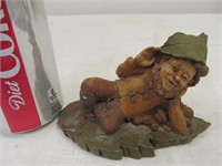 B33d Clark figurine, man reclining w. leaves #79