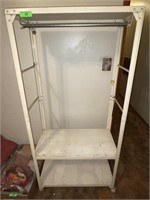METAL ROLLING SHELF WITH HANGER BAR- NEEDS CLEANED