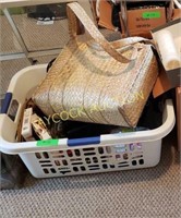 Clothes basket with NEW bras, ladies sweaters,