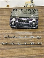 57 Chevy Bel Air radio, & 74 Malibu trim