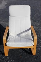 Wood framed chair with removable pad