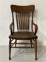 Antique handcrafted wooden armchair