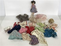 McCall Corp. doll with collection of clothes