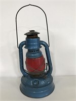 Dietz blue oil lantern with red glass, bent