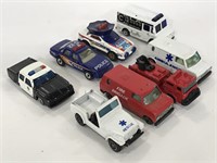 Eight police/ fire truck toy cars