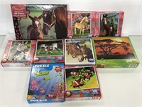 Nine assorted horse, fish, and zebra puzzles