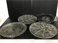 Four crystal and glass hostess serving trays
