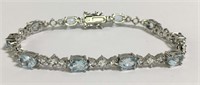 Sterling Silver Bracelet With Blue & Clear Stones