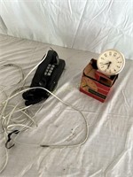 Vintage Wall Phone And Alarm Clock.