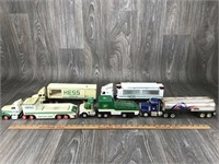 4 Hess Trucks & 1 Fina Truck