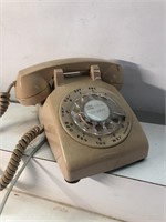 Vintage Rotary telephone beige in color