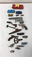 Vintage metal guns cars kazoo clickers