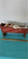 Custom-made wood 23 in doll cradle with doll