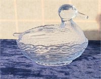 blue covered glass duck