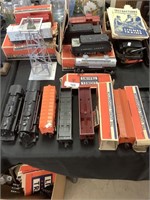 Lionel train engines, cars, transformers, books.