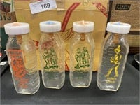 Four Vintage Baby Bottles.