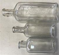 3 CLEAR GLASS BOTTLES 2 ARE RAWLEIGHS ONE PLAIN