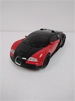 Opened Red Bugatti Transformers toy car
