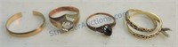 Lot of 5 gold rings, one marked solid gold,