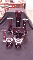 Seven pieces of amethyst glass with silver rim