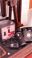 Four items including a black telephone,