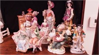 Eight bisque and china figurines of people