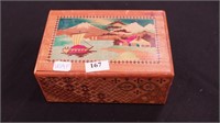 Wood puzzle box with Oriental decoration