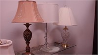 Three contemporary table lamps, all with