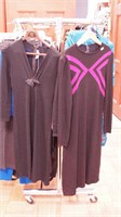 Two St. John knit dresses: both size small, black
