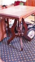 Walnut Eastlake-style table, 30" high x 28" long