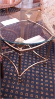 Brass and beveled glass end table with seashell