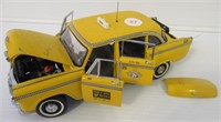 Die cast Franklin Mint checker cab. Measures: