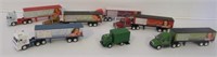 Lot that includes Coca Cola semi trucks, MatchBox