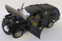 Die cast 1/18 scale Jeep Grand Cherokee. Made by