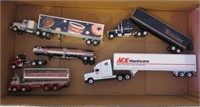 Lot of semi trucks and trailers that include Ace