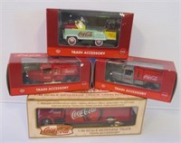 Lot of Die cast Coca Cola train accessories in