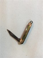 Mini pocket knife with mother of pearl inlay