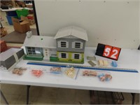 TIN DOLLHOUSE WITH PLASTIC FURNISHINGS