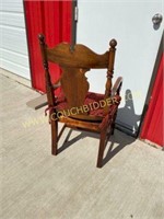 Vintage wooden chair with woven seat