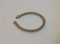 14k yellow gold Diamond Tennis Bracelet features 4