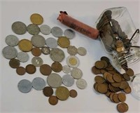 Jar & roll of wheat pennies with other