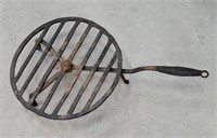 Forged swivel iron pan holder
